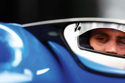 Driver in wing mirror on a Silverstone Track Day