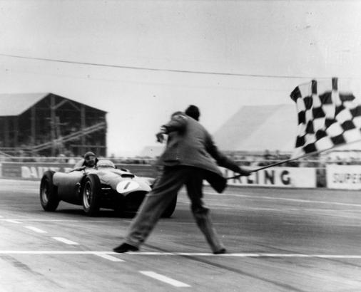 Juan Manuel Fangio finishing at the Grand Prix